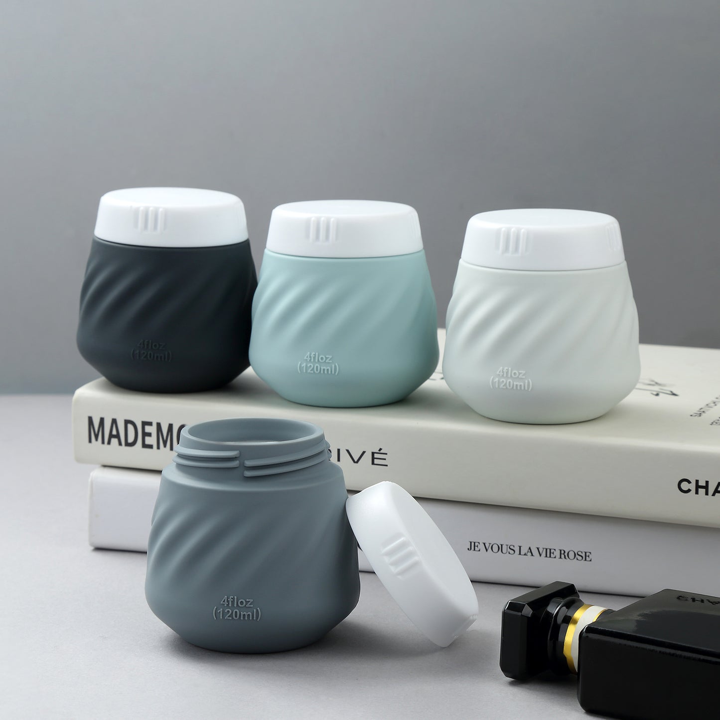 Mrsdry Travel Containers for Toiletries, Silicone Cream Jars TSA Approved Travel Size Containers with Clear Bag, Leak-proof Travel Accessories with Lid for Cosmetic Face Body Hand Cream (4 Pack)