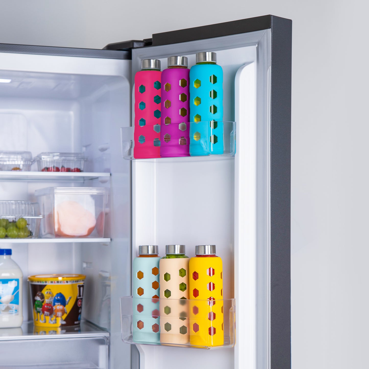 Glass Juice Bottles with Lids and Silicone Sleeves 18 oz, 4-Pack Reusable Clear Glass Water Bottles with Stainless Steel Airtight Cap for Juicing, Refrigerator, BPA Free Leak-Proof Drinking Jar