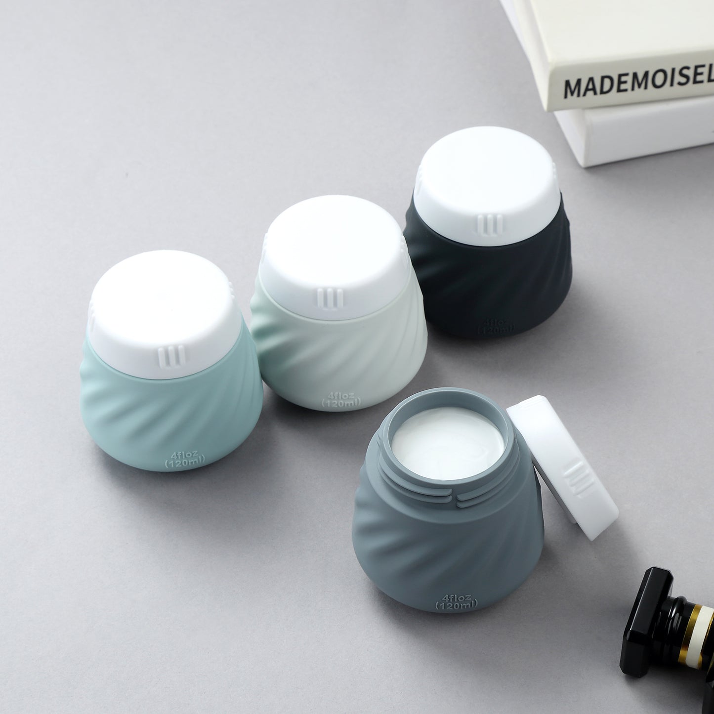 Mrsdry Travel Containers for Toiletries, Silicone Cream Jars TSA Approved Travel Size Containers with Clear Bag, Leak-proof Travel Accessories with Lid for Cosmetic Face Body Hand Cream (4 Pack)