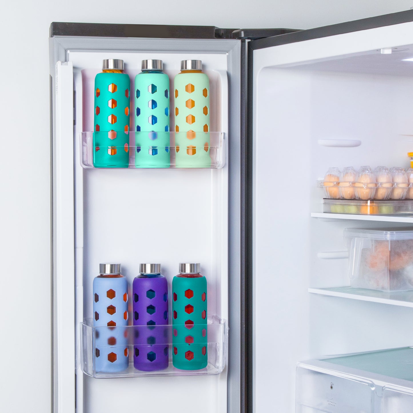 Glass Juice Bottles with Lids and Silicone Sleeves 18 oz, 4-Pack Reusable Clear Glass Water Bottles with Stainless Steel Airtight Cap for Juicing, Refrigerator, BPA Free Leak-Proof Drinking Jar